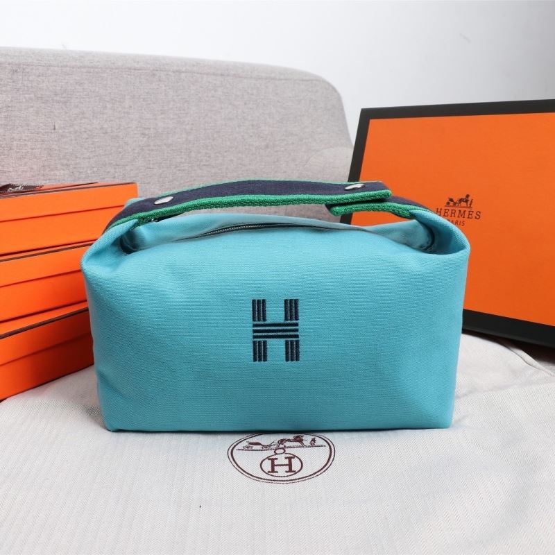 H**mes clutch bags